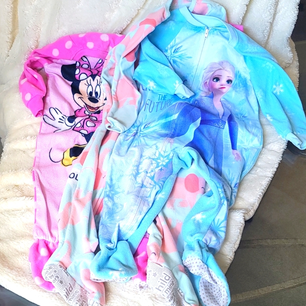2 size 2T and 1 24 month onesies sleepers